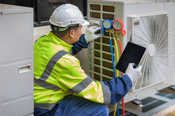 Professional Air Conditioning Repair technician working in Shrewsbury, MA